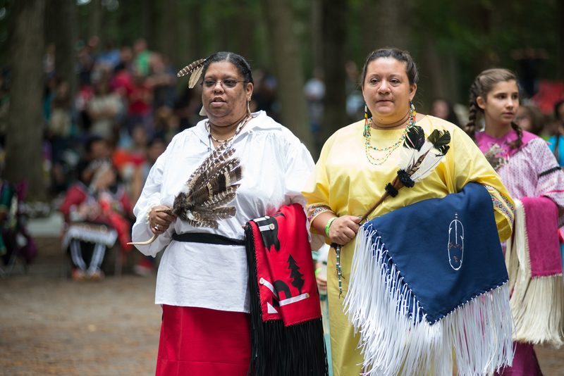 Stacey Bliss Ricketts, from the Nanticoke Lenni Lenape Tribe of N.J., left, and Lesley Gould Combs from the Lenape Tribe, participate in the grand entry. BY DENY HOWETH